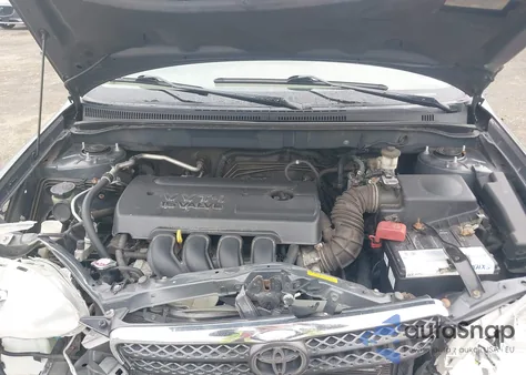 2005 Toyota Corolla Le z USA, uszkodzony, nr VIN 2T1BR30E85C360254